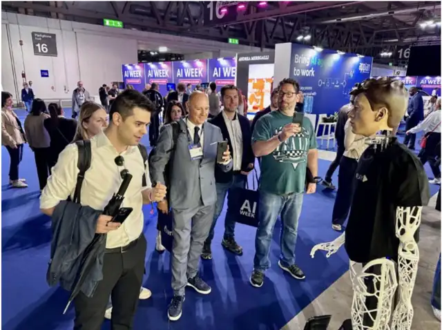 Robot engaging conference visitors